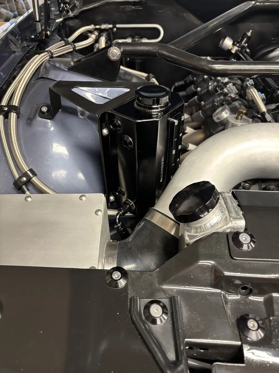 Remote Power Steering Reservoir and Coolant Expanse