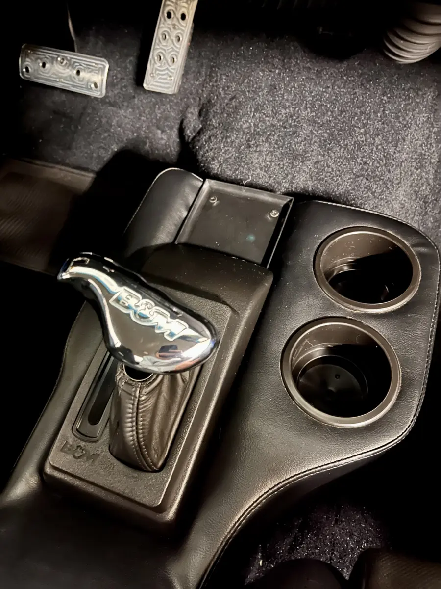 Added a console with an armrest and cup holders - 1973 Dodge Dart