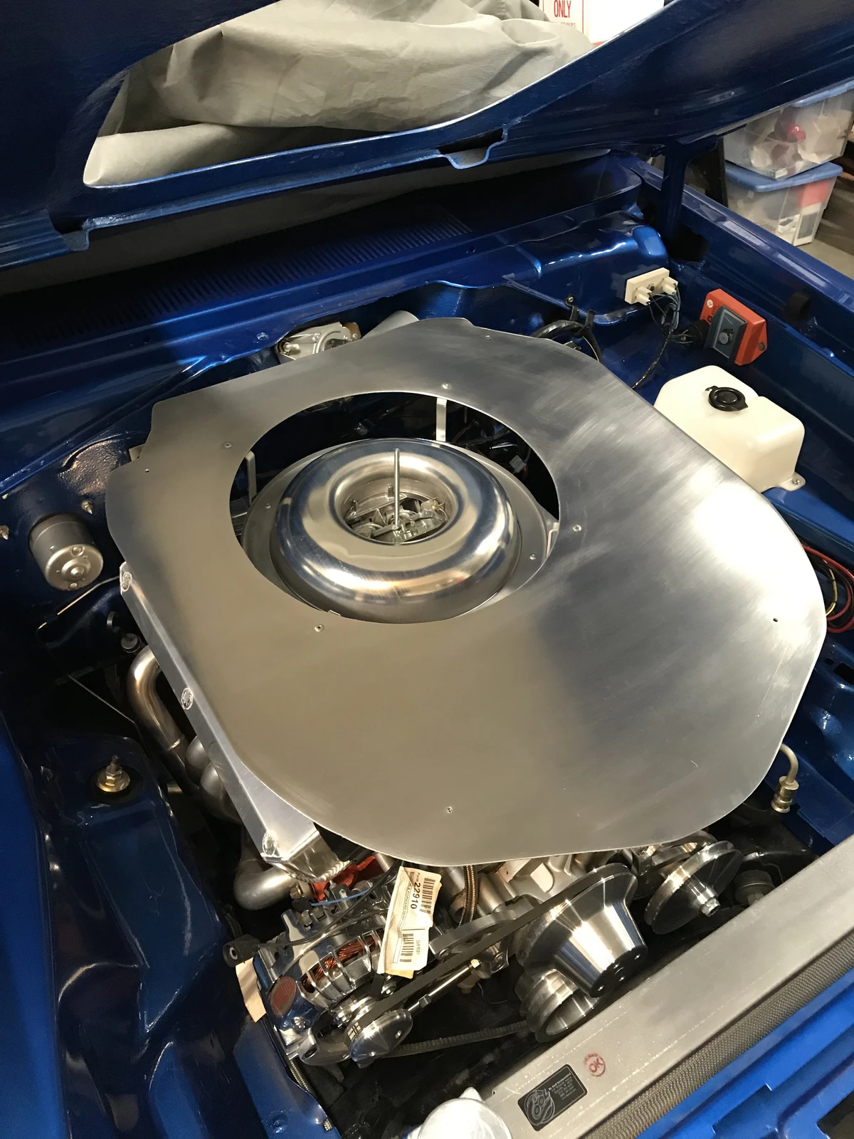 Attaching the carburetor base to shaker platform - 1973 Dodge Dart