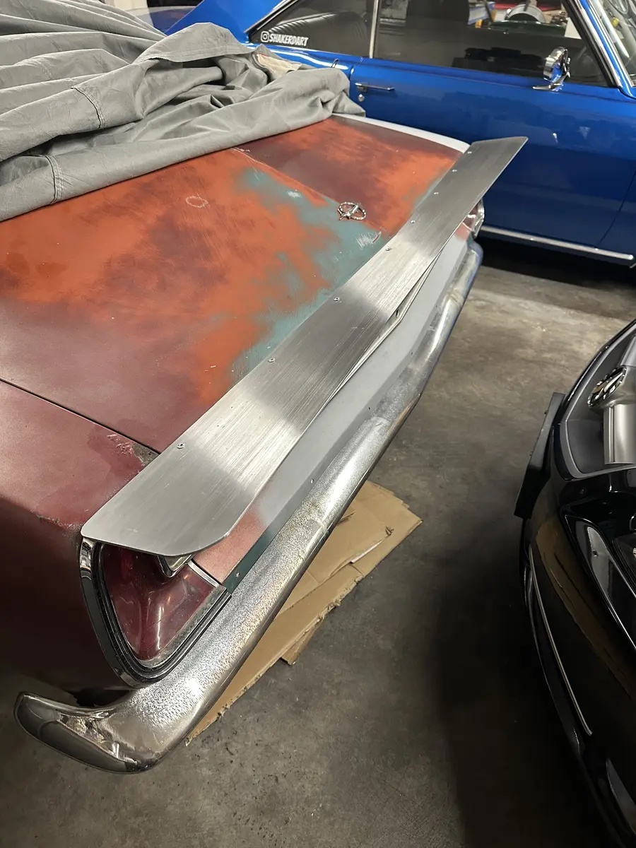 Aluminum wing attached to trim - 1967 Plymouth Barracuda