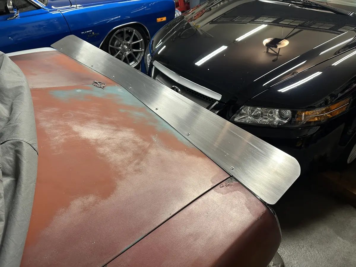Aluminum wing attached to trim - 1967 Plymouth Barracuda
